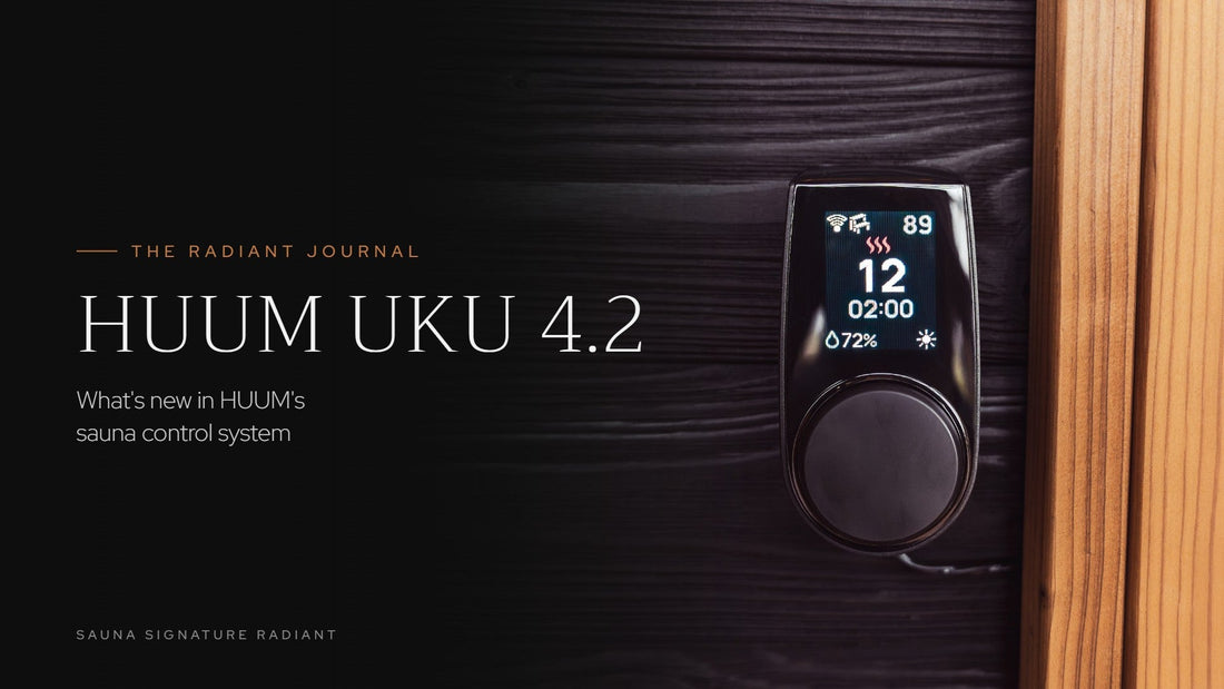 HUUM UKU 4.2 Wi-Fi control panel showing temperature and humidity on a dark wood sauna wall